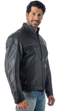 Charger l'image dans la galerie, Man wearing black vented leather motorcycle jacket with light reflector and zippers, showcasing protective and stylish design.