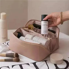 Cargar imagen en el visor de la galería, High-Capacity Leather Cosmetic Organizer on a vanity, showcasing organized makeup and brushes for clutter-free beauty routine.