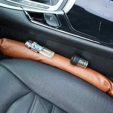 Cargar imagen en el visor de la galería, PU leather pad seat filler preventing items from falling between car seat and console, featuring eco-friendly and durable design.