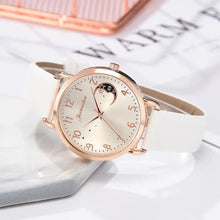 Charger l'image dans la galerie, Elegant moon bracelet watch with celestial dial on white strap, ideal for modern women's style and sophistication.