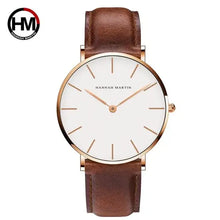 Cargar imagen en el visor de la galería, High-quality rose gold dial leather watch with minimalist design and genuine leather strap, perfect for both casual and formal wear.