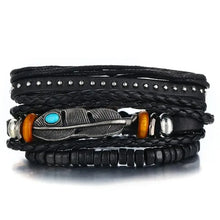 Charger l'image dans la galerie, Multilayer leather bracelet with feather charm, turquoise bead, and wooden accents, perfect for adding rugged elegance to any outfit.