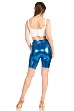 Cargar imagen en el visor de la galería, Shiny metallic blue unisex bike shorts, stretchy fabric, back view, made in USA, model wearing white top and heels, fashion apparel.