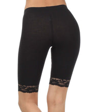 Load image into Gallery viewer, Back view of black cotton blend lace trim bike shorts with stretch fit, showing lace detail, designed and made in USA.