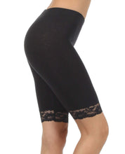 Load image into Gallery viewer, Black cotton blend lace trim stretch bike shorts, side view, made in USA. Comfortable activewear with elegant lace detail.