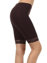 Load image into Gallery viewer, Side view of cotton blend lace trim stretch bike shorts in black, showing lace detail on hem - Made in USA