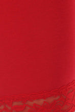 Load image into Gallery viewer, Close-up of red cotton blend lace trim on bike shorts showing detail of stretchy fabric.
