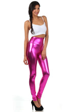 Cargar imagen en el visor de la galería, Woman wearing shiny liquid metallic high waist stretch leggings in bold pink, paired with a white crop top. Made in USA.