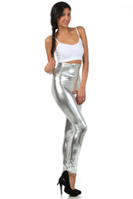 Cargar imagen en el visor de la galería, Shiny liquid metallic high waist stretch leggings, made in USA, modeled with a white top and black heels, Sakkas fashion