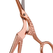 Cargar imagen en el visor de la galería, Close-up of ornate copper scissors with intricate detailing, partially open.