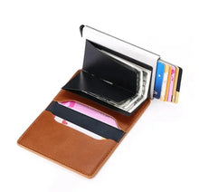 Cargar imagen en el visor de la galería, Open anti-theft leather wallet with RFID/NFC protection, displaying multiple card slots and cash storage, made from vegan PU leather.