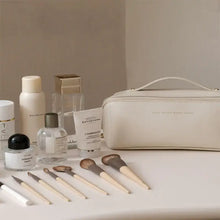 Cargar imagen en el visor de la galería, High-Capacity Leather Cosmetic Organizer with beauty products and makeup brushes on vanity