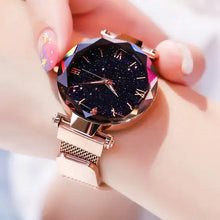 Load image into Gallery viewer, Alt Tag: Elegant starry sky women's watch with celestial design, gold mesh band, and sparkling accents on wrist.