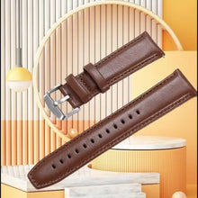Cargar imagen en el visor de la galería, Brown leather watch band crafted from Italian calf skin with hand-stitched edges, displayed on a stylish, modern background.