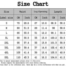Load image into Gallery viewer, Size chart for steampunk leather skinny pants, includes measurements for waist, leg opening, and length in CM and inches.