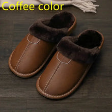 Cargar imagen en el visor de la galería, Men's warm vegan leather slippers in coffee color with plush lining on wooden floor, offering cozy comfort and style.