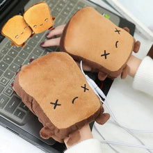 Charger l'image dans la galerie, Cozy toast-shaped hand warmers plugged into a laptop, designed to keep hands warm and comfortable in cold weather.
