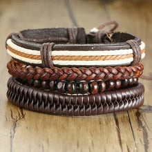 Cargar imagen en el visor de la galería, Vnox 4Pcs Set Braided Vegan Leather Bracelets with Zinc Alloy Accents Rests on Wooden Surface