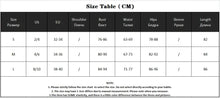 Load image into Gallery viewer, Size chart for women's vegan leather mini dress in CM; includes US and EU sizes, shoulder, bust, waist, hips, sleeve, and length details.