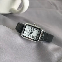 Cargar imagen en el visor de la galería, Retro Women's Classic Quartz Watch with Vegan Leather Strap on a Grey Fabric Background