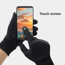 Load image into Gallery viewer, Person using smartphone with Touch Cold Waterproof Gloves, showcasing touchscreen compatibility and weather resistance.