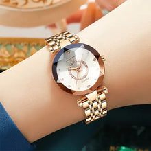 Cargar imagen en el visor de la galería, Elegant quartz watch with stainless steel band on wrist, showcasing a sophisticated design perfect for women.