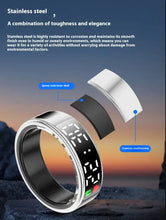 Cargar imagen en el visor de la galería, Smart ring with display screen showcasing stainless steel design and durability in a rugged outdoor setting.