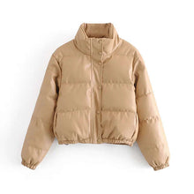 Load image into Gallery viewer, Women's thick PU leather winter coat in beige, offering cozy warmth and stylish comfort for cold weather.