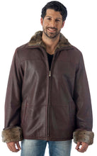 Cargar imagen en el visor de la galería, Man wearing a brown leather jacket with fur trim on a white background