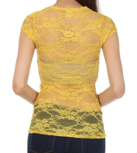 Charger l'image dans la galerie, Back view of a yellow floral lace cap sleeve tunic tee, showcasing delicate sheer design, made in USA.