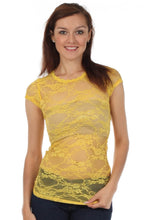 Charger l'image dans la galerie, Woman wearing yellow stretch floral lace cap sleeve tunic length tee, showcasing slim fit and scoop neckline, perfect for layering.