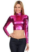 Load image into Gallery viewer, Model wearing metallic pink liquid mock neck turtleneck long sleeve crop top, paired with dark jeans.