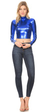 Load image into Gallery viewer, Metallic liquid blue mock neck turtleneck long sleeve crop top styled with jeans, highlighting shiny texture and modern fit.