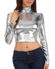 Load image into Gallery viewer, Woman wearing a metallic liquid mock neck turtleneck long sleeve crop top, styled with jeans. Made in USA fashion.