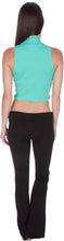 Charger l'image dans la galerie, Back view of woman wearing a teal mock neck sleeveless turtleneck crop top paired with black pants.