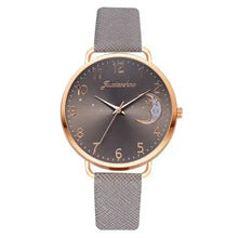 Charger l'image dans la galerie, Women's watch with moon-phase dial, gold case, and gray strap from the Moon Bracelet & Watch Set, offering elegance and sophistication.