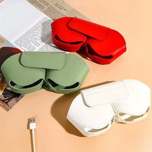 Load image into Gallery viewer, Three colorful leather cases for AirPods Max headphones in red, green, and white on a neutral background with magazine and USB cable.