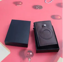 Load image into Gallery viewer, Minimal leather credit card holder in gift box on festive red background, showing sleek and stylish design.