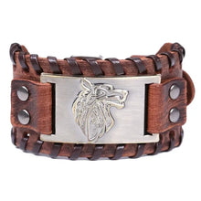 Load image into Gallery viewer, Vintage wide leather woven bracelet with intricate wolf head symbolizing strength and independence.