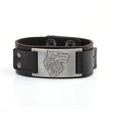 Load image into Gallery viewer, Vintage wide leather woven bracelet with a wolf head centerpiece symbolizing strength and independence.