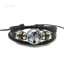 Cargar imagen en el visor de la galería, Handmade leather bracelet with wolf and full moon design, showcasing high-quality craftsmanship and style.