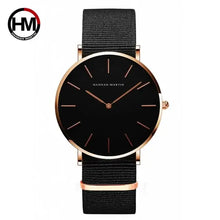Cargar imagen en el visor de la galería, Luxurious rose gold leather watch with a minimalist black dial and genuine leather strap, versatile for casual and formal wear.