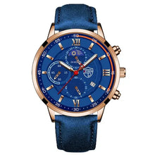 Cargar imagen en el visor de la galería, Men's casual leather watch with blue dial and strap, featuring gold-tone accents and chronograph details for timeless elegance.