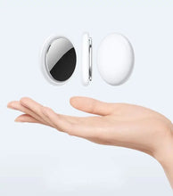 Load image into Gallery viewer, Hand displaying eThings Pet GPS Location Tracker with Bluetooth 4.0, built-in GPS locator; a sleek, mini design for pet safety.