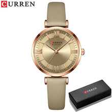 Cargar imagen en el visor de la galería, Elegant women's leather wristwatch with classic clockface and quartz movement from Curren. Includes black gift box packaging.