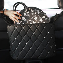 Cargar imagen en el visor de la galería, Luxury vegan leather car handbag holder seat back organizer with floral bag, maximizing storage in vehicle interior.