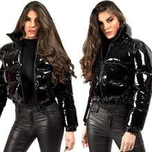 Cargar imagen en el visor de la galería, Woman wearing a shiny PU leather winter jacket, showcasing the sleek and glossy vegan leather finish and stylish design.