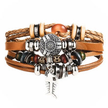 Charger l'image dans la galerie, Multilayer leather bracelet with metal charms and braided details for stylish and durable accessory wear.