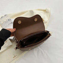 Cargar imagen en el visor de la galería, Open small leather chain shoulder bag showcasing interior design