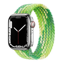 Load image into Gallery viewer, Green nylon braided strap for Apple Watch Series 3-7 displayed on a watch face, compatible with 38mm to 45mm sizes.